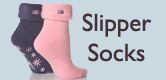 Slip into a sumptuous pair of Slipper & Bed Socks, available at SockShop.co.uk