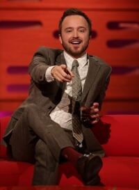 Aaron Paul opts for burgundy socks