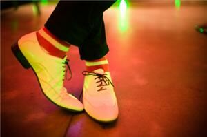 New Zealanders don red socks for charity