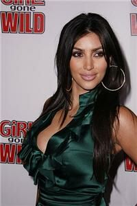 Kim Kardashian shows her assets in leggings