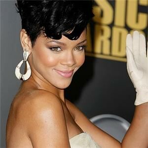 Sassy Rihanna steps out in PVC stockings