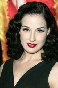 Dita rolls on stockings for charity shoot