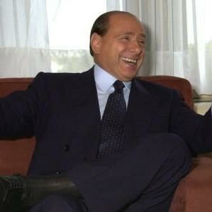 Berlusconi judge condemned for turquoise socks