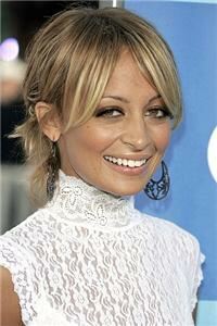 Nicole Richie: Tights are a staple for my look