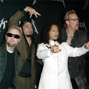 Rock around the socks: Metallica drummer has roadies don his legwear