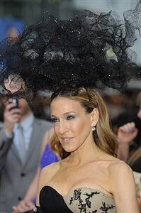 SJP in the city with spotty tights