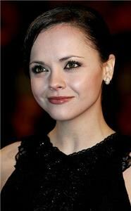 Christina Ricci: two dresses, one pair of tights
