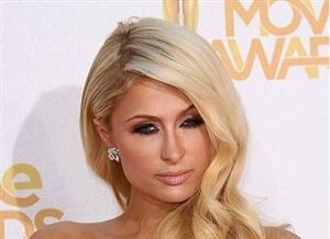 Paris Hilton wears black tights for sophisticated look