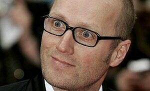 Ade Edmondson a 'bald, bespectacled swan' in tights