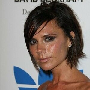 Pregnant Victoria Beckham comfy in black tights