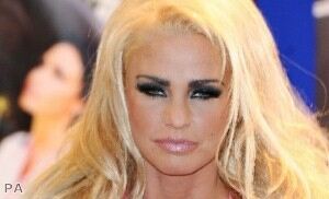 Katie Price looking relaxed in blue leggings