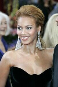 Beyonce headlines in sheer fishnet tights