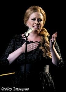 Adele stays classy in tights at Mercury music awards