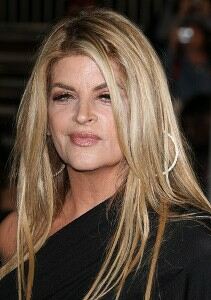 Kirstie Alley models in black leggings