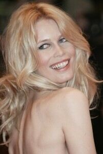 Claudia Schiffer stands out in black tights