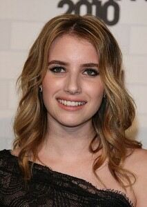 Emma Roberts dons black tights for glittering event