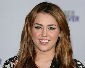 Miley Cyrus shows off underwear in sheer dress