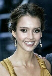 Jessica Alba wraps up in big brown scarf