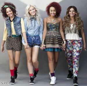 Little Mix perform in trademark patterned leggings