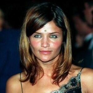 Helena Christensen dons blue tights for fashion event