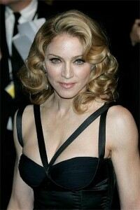 Madonna bowls over the crowd in fishnet tights