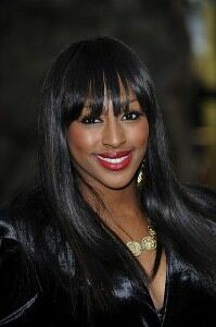 Alexandra Burke goes wild in tiger print tights