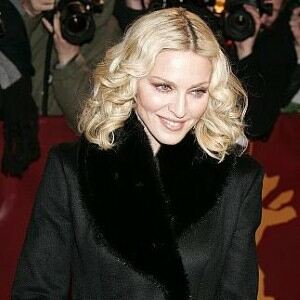 Madonna overexposes with fishnet tights