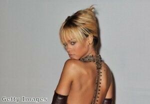 Rihanna spices up outfit with suspender tights