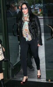 Cher rolls back the years in leggings