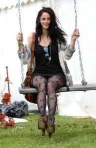 Kaya Scodelario braves mud at Isle of Wight festival