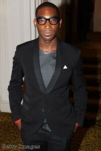 Tinie Tempah dons yellow socks for Polo Final