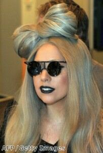 Lady Gaga slips into fishnet tights for date night