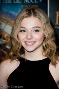 Chloe Moretz appears mature in leather leggings