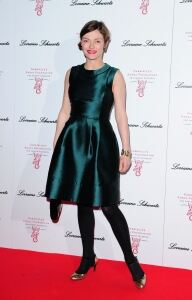 Camilla looks glam in black tights