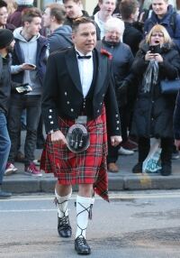 Cheeky Cowell lifts Walliams' kilt