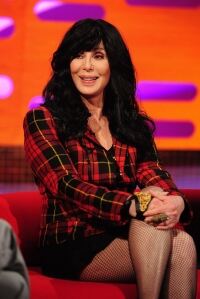 Cher models fishnet tights