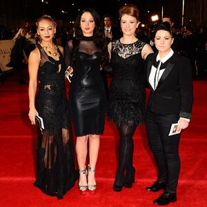 Ella keeps things elegant in opaque tights