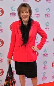 Esther wears fluffy scarf to event