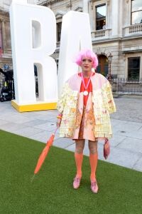 Grayson Perry wears neon socks