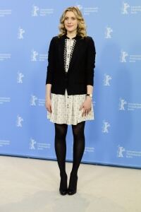 Greta opts for opaque black tights