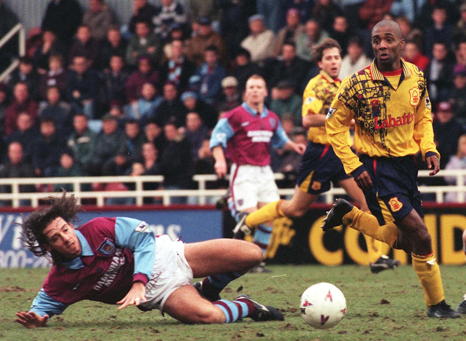 Man down: Could it be he was overly shocked by this Nottingham Forest away kit? Man down: Could it be he was overly shocked by this Nottingham Forest away kit?