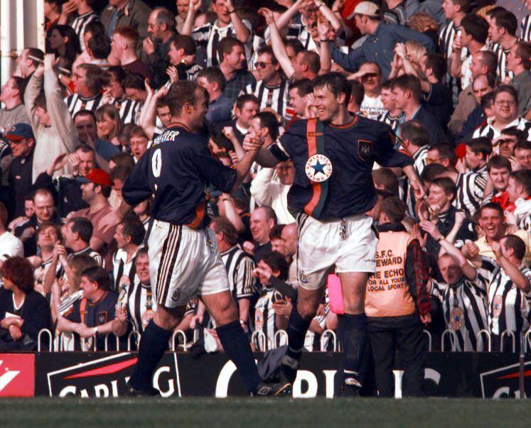 Robert Lee celebrates a less recognisable Newcastle kit