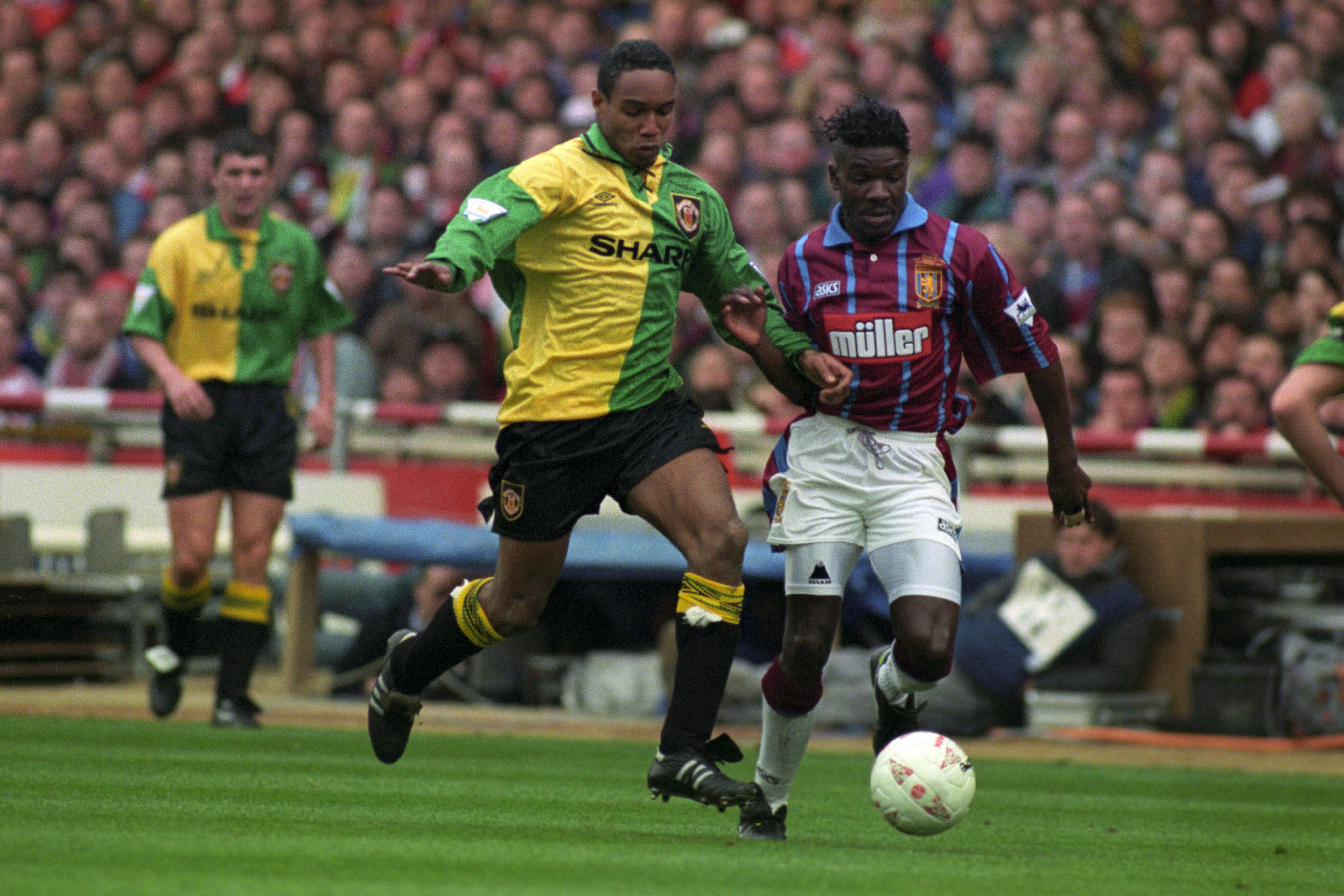 Paul Ince tries to outrun his strip