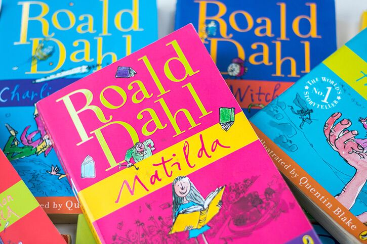 A stack of Roald Dahl books, with Matilda on top 