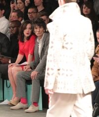Ronnie Wood shows off red socks