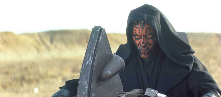 Darth Maul showcasing his iconic black robe / red face look. Image courtesy Disney