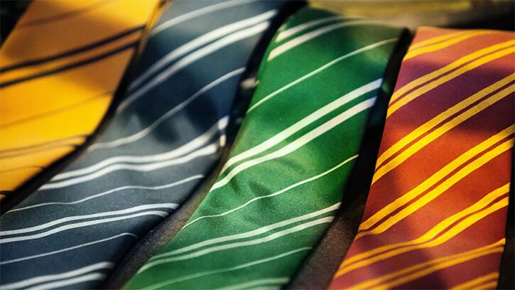 What colour tie should you wear for an interview? Striped ties laid out in a row